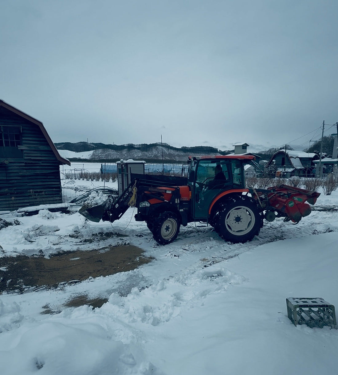 88歳親方のトラクター除雪に見惚れる